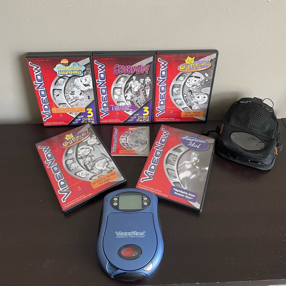 VideoNow 2003 Personal Video Player Storage Case And 12 Disks. Tested, Works!